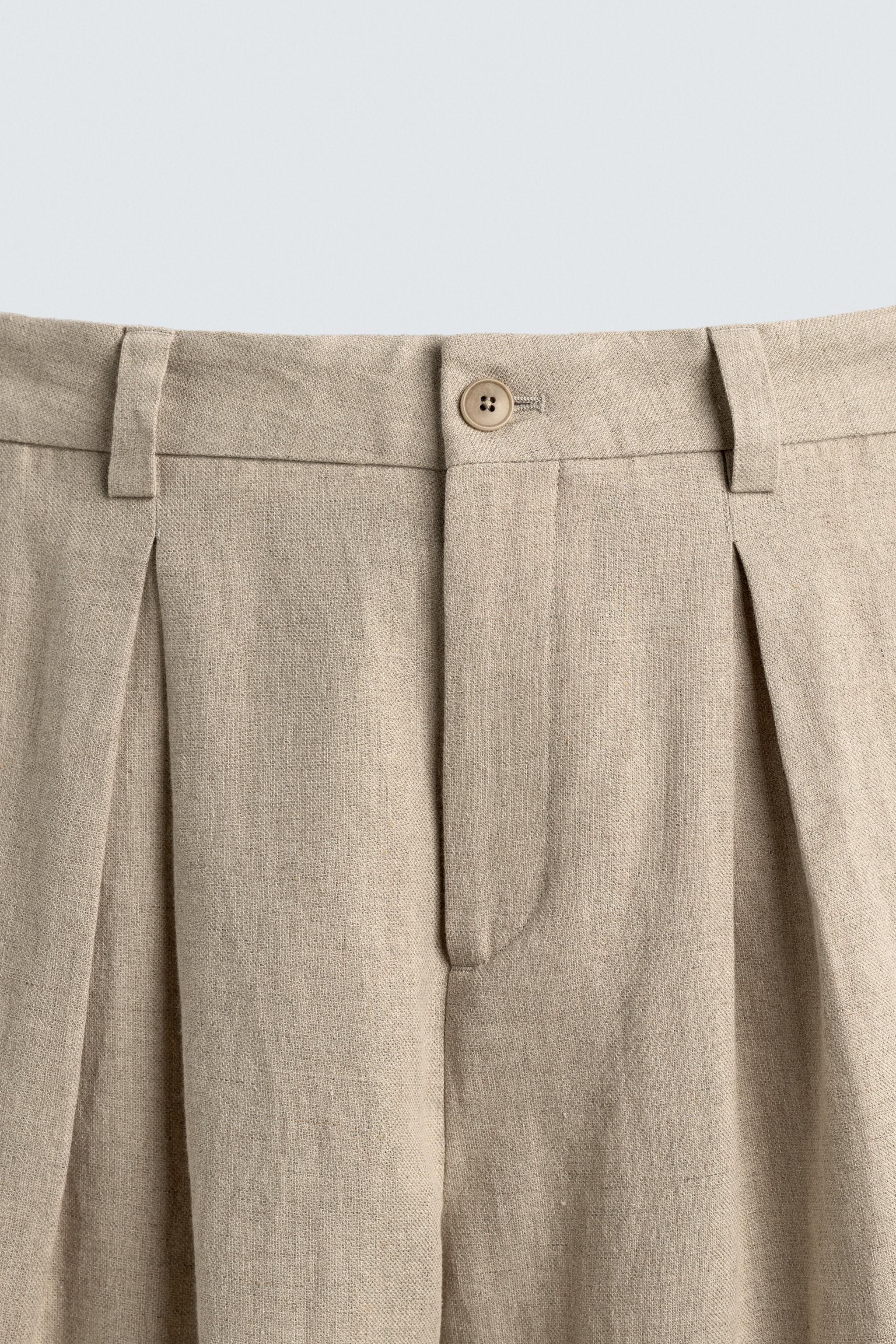 RELAXED FIT PLEATED SUIT PANTS